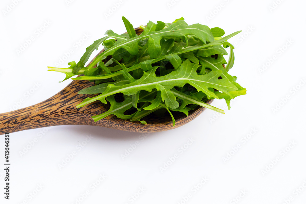 Fresh green rocket salad on white background. Fresh green rocket salad on white background.