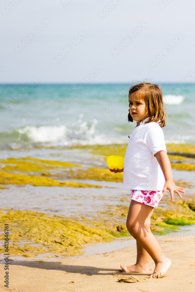 portrait of girl walking on the beach portrait of girl walking on the beach