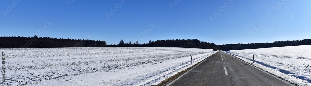 Way and road into the winter landscape cold season wonderful panorama. Cold season with snow and blue sky. Way and road into the winter landscape cold season wonderful panorama. Cold season with snow and blue sky.