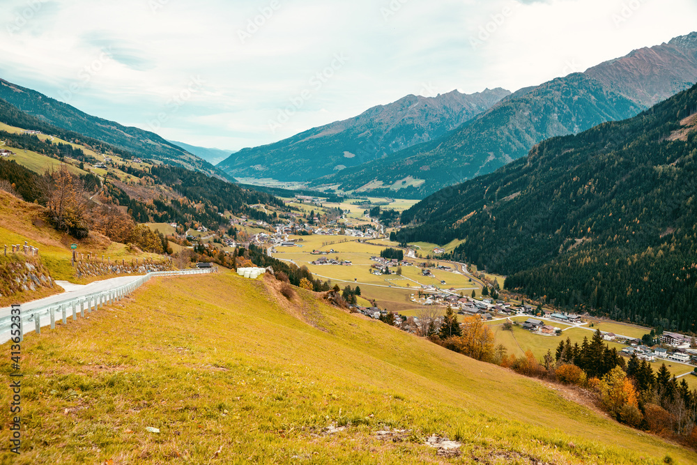 Naklejka premium A beautiful village in a mountain valley. Peaceful quiet