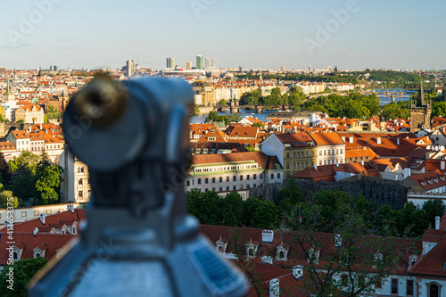 Binoculars near the black tower in Prague, Czech Republic photo