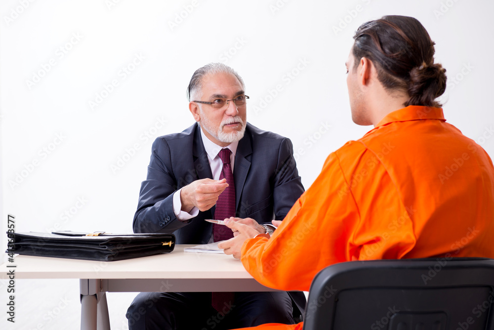 Young captive meeting with advocate in pre-trial detention Young captive meeting with advocate in pre-trial detention