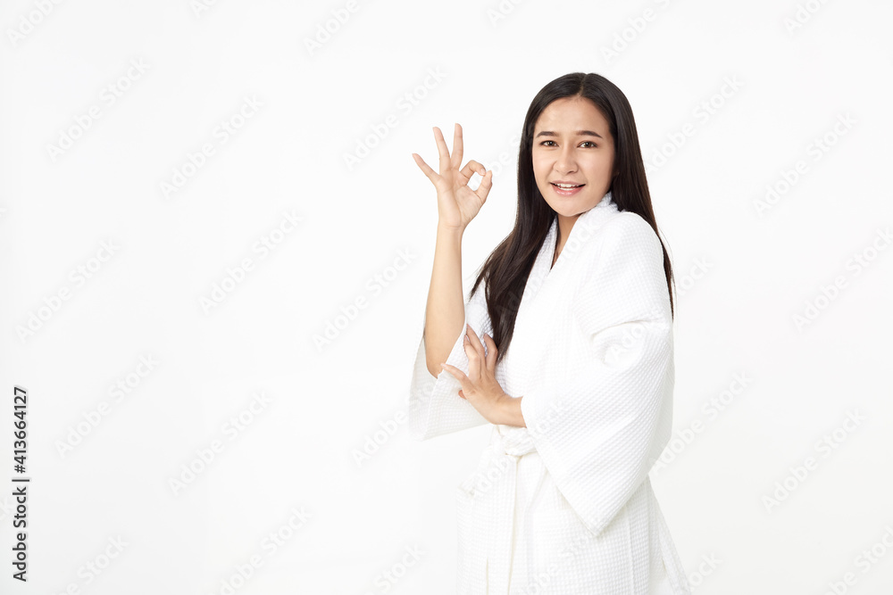 Young Asian woman wearing a bathrobe Young Asian woman wearing a bathrobe