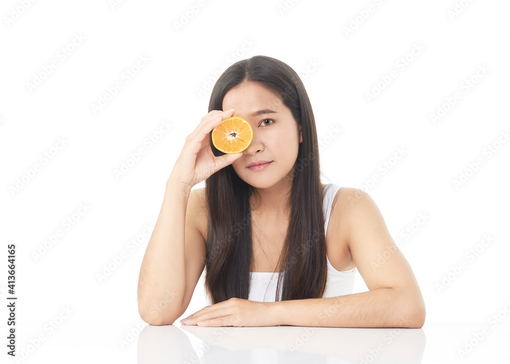 Portrait of a beautiful young woman with orange Portrait of a beautiful young woman with orange