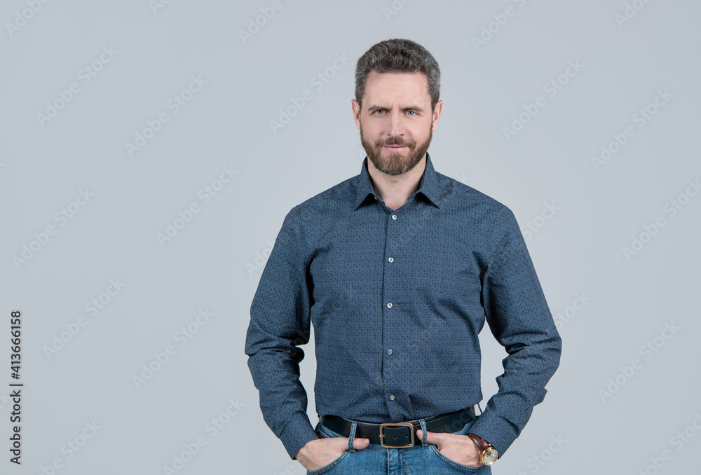 Clothes that you need in your wardrobe. Bearded man wear shirt with jeans. Clothes that matter