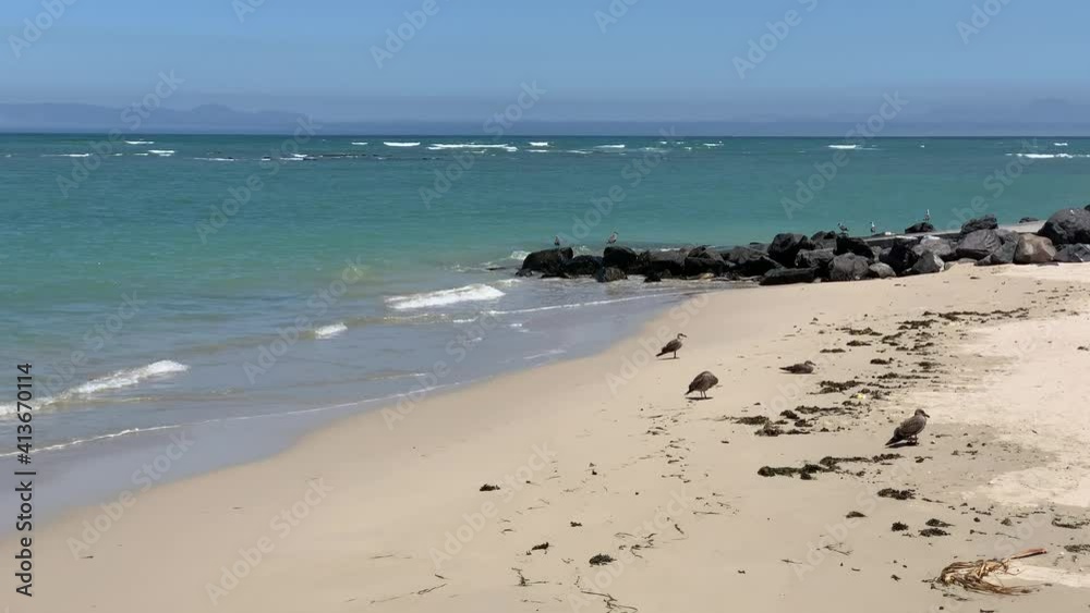 Strand beach rocky ocean side of False Bay and rocky side of boat slip Strand beach rocky ocean side of False Bay and rocky side of boat slip