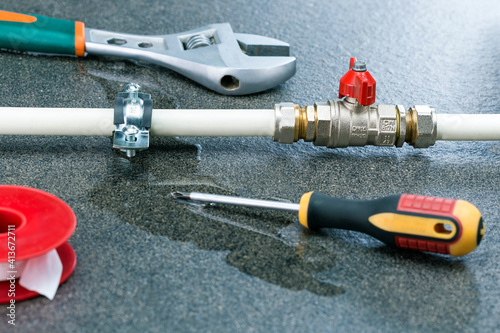 Repair broken of a water pipe in bathroom or kitchen. Repair plumbing concept.