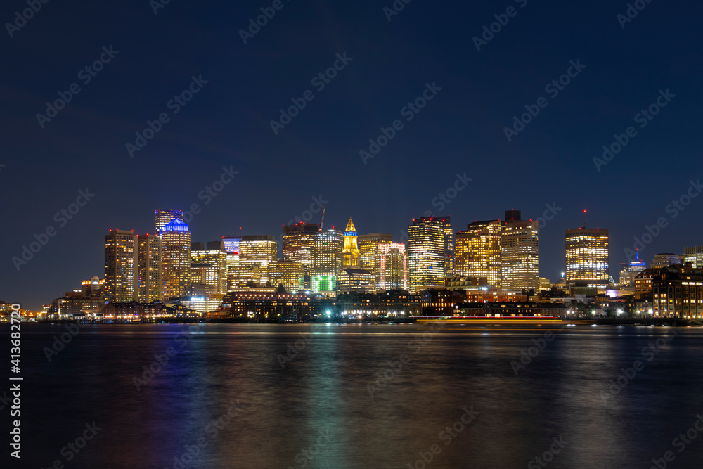 Boston City Skyscrapers, Custom House and Boston Waterfront at night from East Boston, Boston, Massachusetts MA, USA.