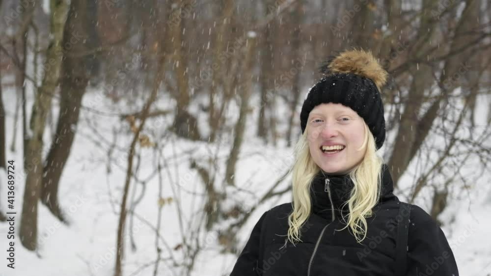 Girl in snow laughing in slomotion Girl in snow laughing in slomotion