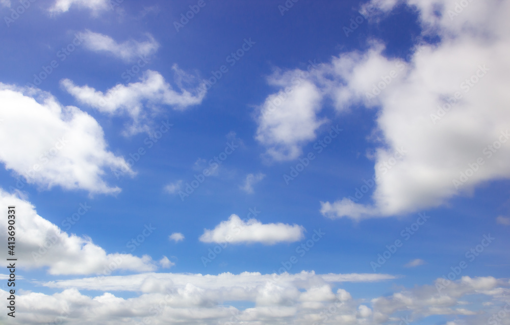 Tropical fluffy white cloudy over blue sky on sunny day. Tropical fluffy white cloudy over blue sky on sunny day.