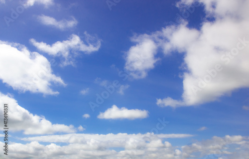 Fototapeta Naklejka Na Ścianę i Meble -  Tropical fluffy white cloudy over blue sky on sunny day.