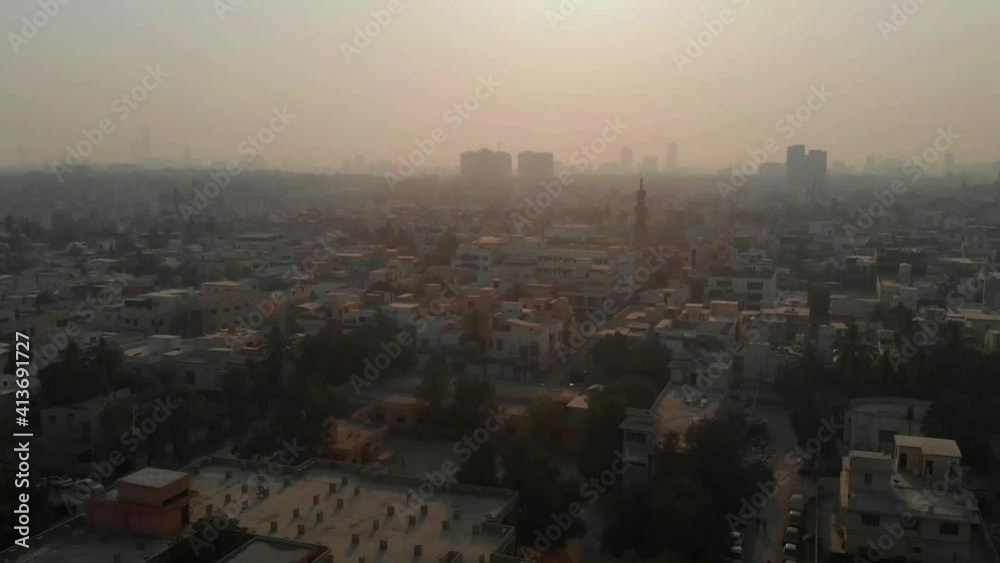 Aerial View Of Air Pollution Over Karachi City In Pakistan. Parallax Follow Shot Aerial View Of Air Pollution Over Karachi City In Pakistan. Parallax Follow Shot