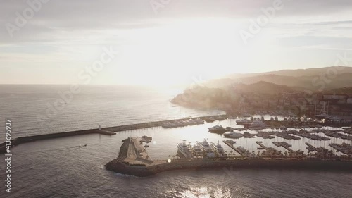 Imperia Porto Maurizio sunset aerial view over the port harbor city in Liguria, Mediterranean sea. Imperia Borgo Prino. photo