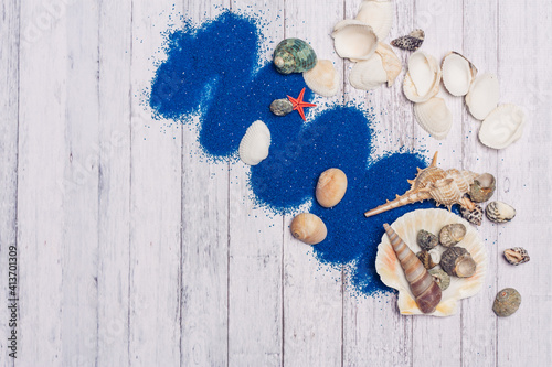 seashells decoration blue sand wooden background scenery ocean