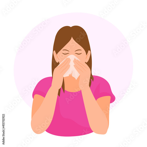 Girl shaking her nose with a handkerchief 