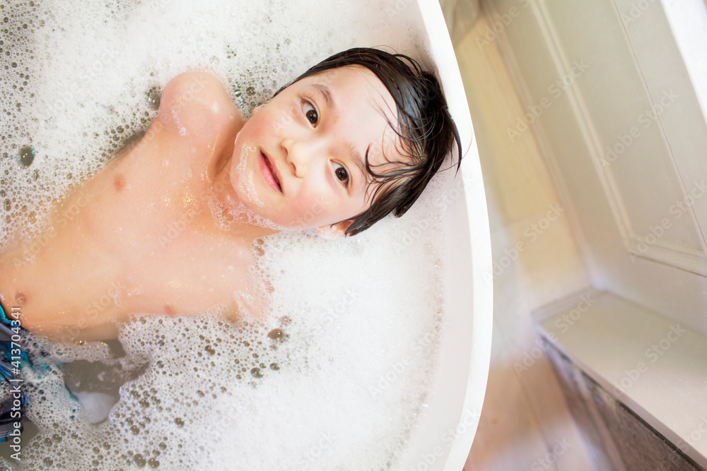 Overhead view of boy bathing at home Overhead view of boy bathing at home