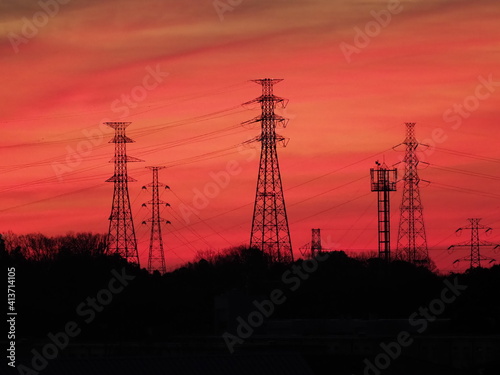 Tokyo,Japan-February 10, 2021: Silhouette of power line at dawn in Tokyo 