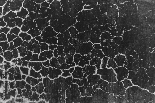 Background image of a wall with cracks. Black and white image.