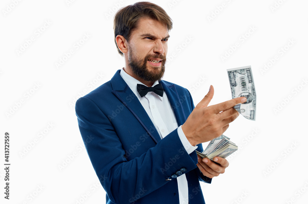 happy man scatter money on light background suit model business finance happy man scatter money on light background suit model business finance