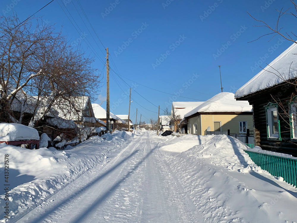 Turgenev Street in the city of Ivdel in winter in clear weather. Russia, Sverdlovsk region