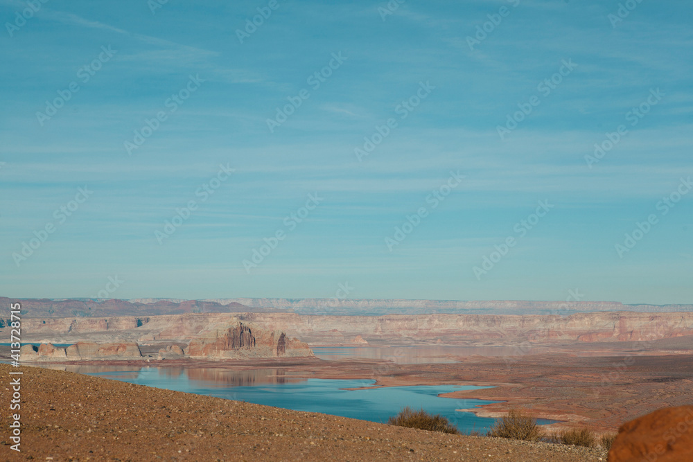 Scenic view of landscape against blue sky Scenic view of landscape against blue sky