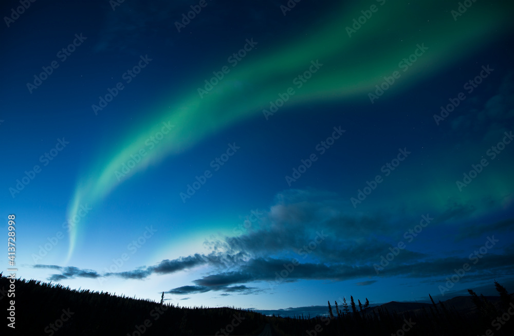 Scenic view of aurora borealis against blue sky at night Scenic view of aurora borealis against blue sky at night