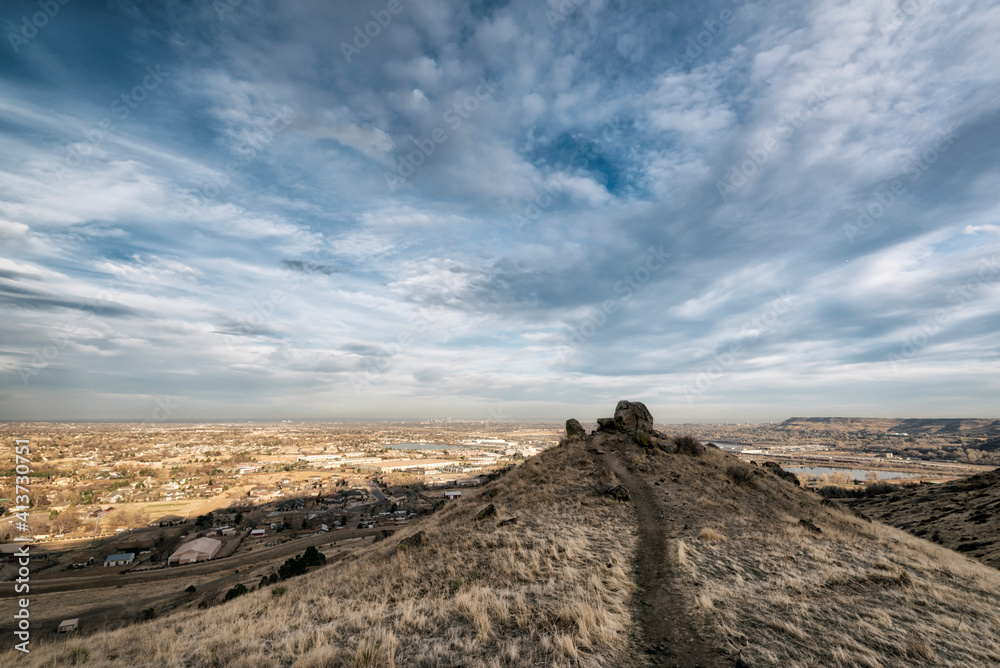 Scenic view of landscape against cloudy sky Scenic view of landscape against cloudy sky