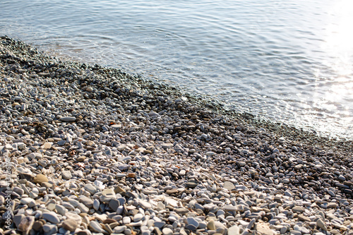 Small stones on the beach near the sea