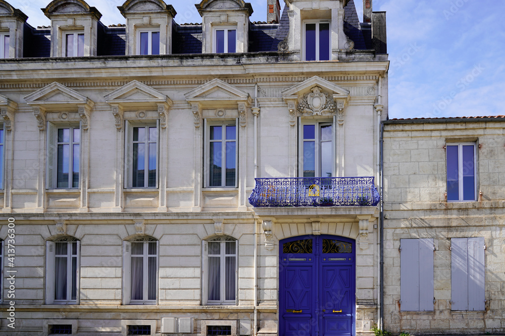classic Haussmann style old residential building in Bordeaux city in France