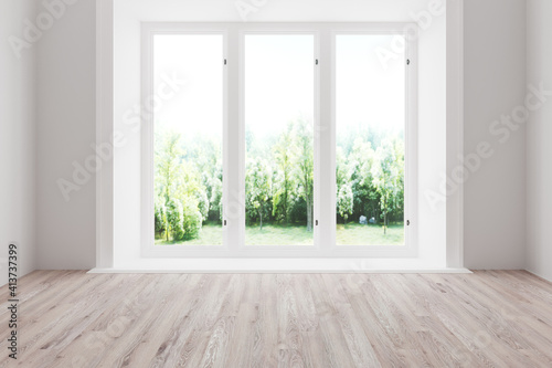 White empty room with summer landscape in window. © rozaivn58