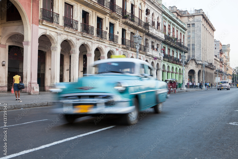 Blurred motion of car moving on city street Blurred motion of car moving on city street
