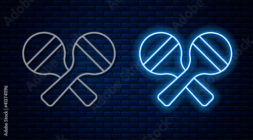 Glowing neon line Maracas icon isolated on brick wall background. Music maracas instrument mexico. Vector.
