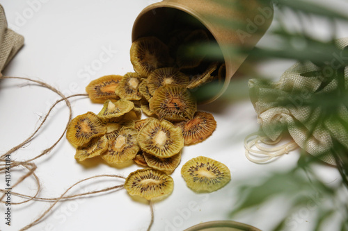 Dried fruit on colored background. Pattern of a fruit frips. Healthy eating photo