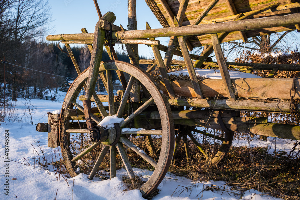 old wooden cart in winter