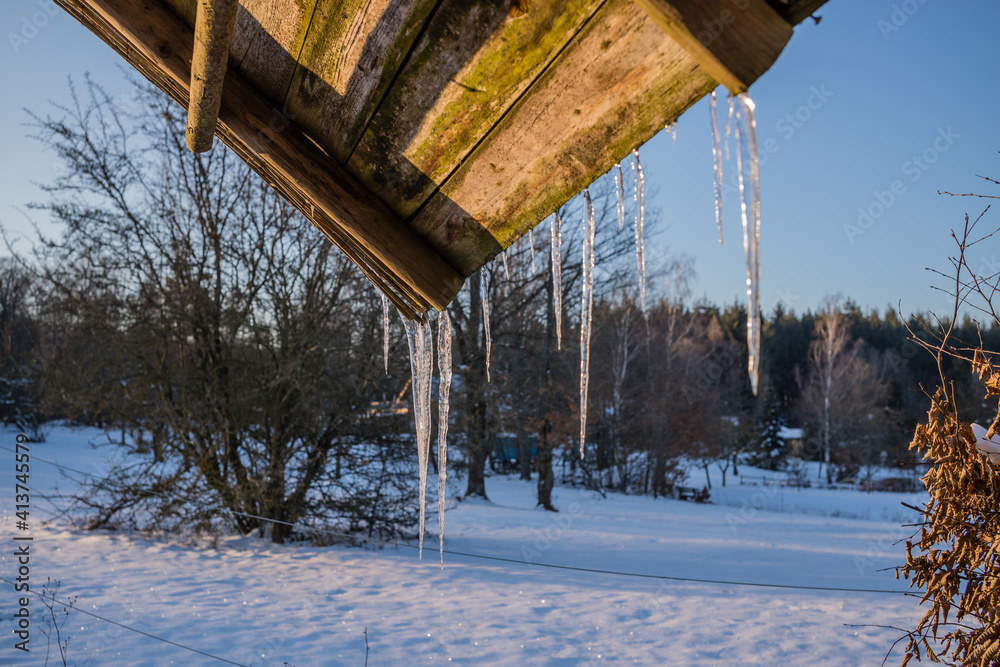 Fototapeta premium icicles on a roof