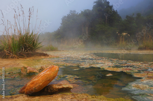 Natural hot pools in Copland track in New Zealand photo