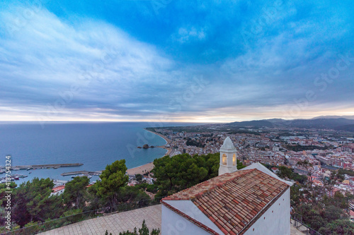 Nice village of Blanes at sunset, with a spectacular sky photo