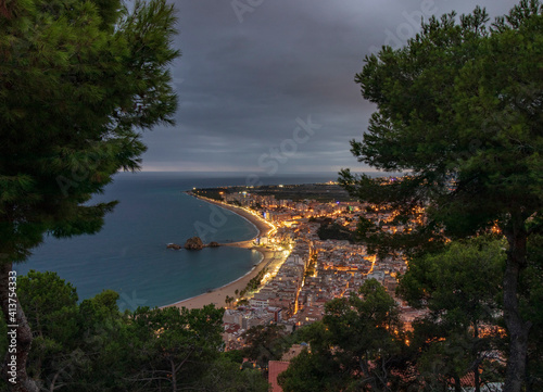 Nice village of Blanes at sunset, with a spectacular sky photo