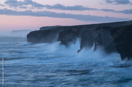 Waves crass against cliffs at Yesnaby, Orkney, Scotland