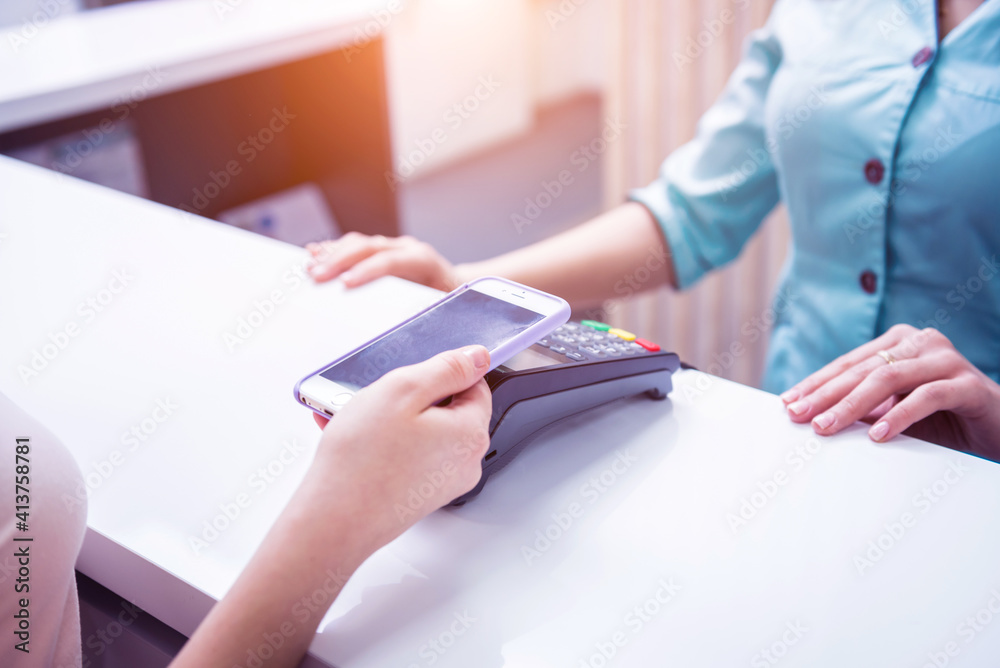Fototapeta premium Mobile payments concept with modern NFC technology