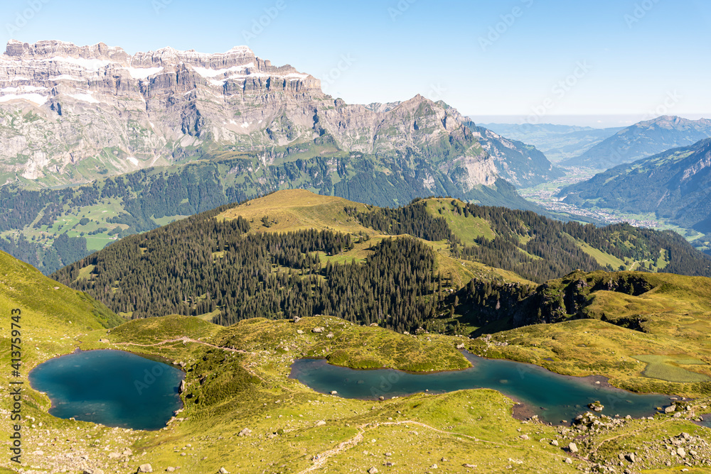 panoramic view of the Glarus Alps and valleys with the Glärnisch mountain range in the background