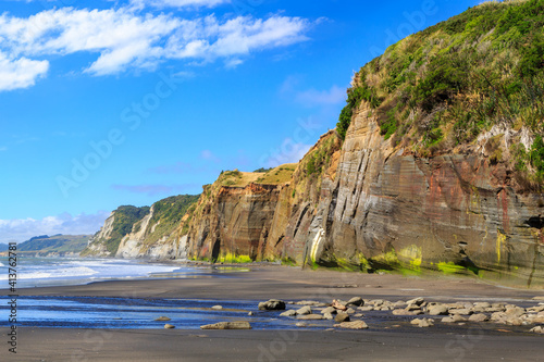 Steep ocean cliffs at Whitecliffs in the Taranaki Region, New Zealand photo