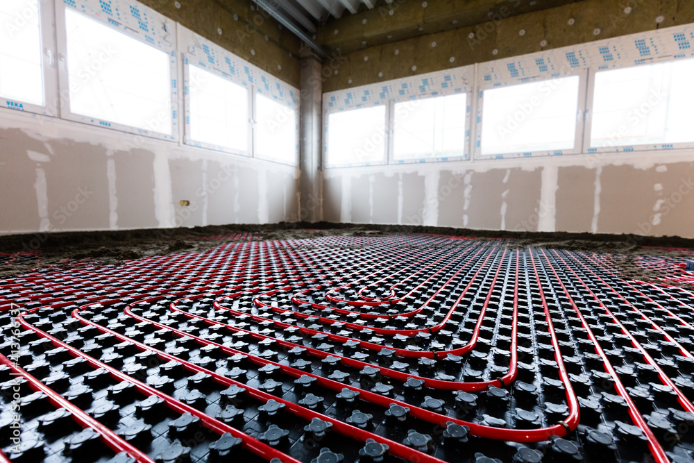 Naklejka premium Floor heating in a new building. Interior design and finishing industry