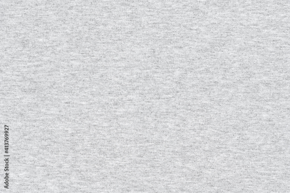 Fototapeta premium White natural texture of knitted wool textile material background. White crochet cotton fabric woven canvas texture. close up