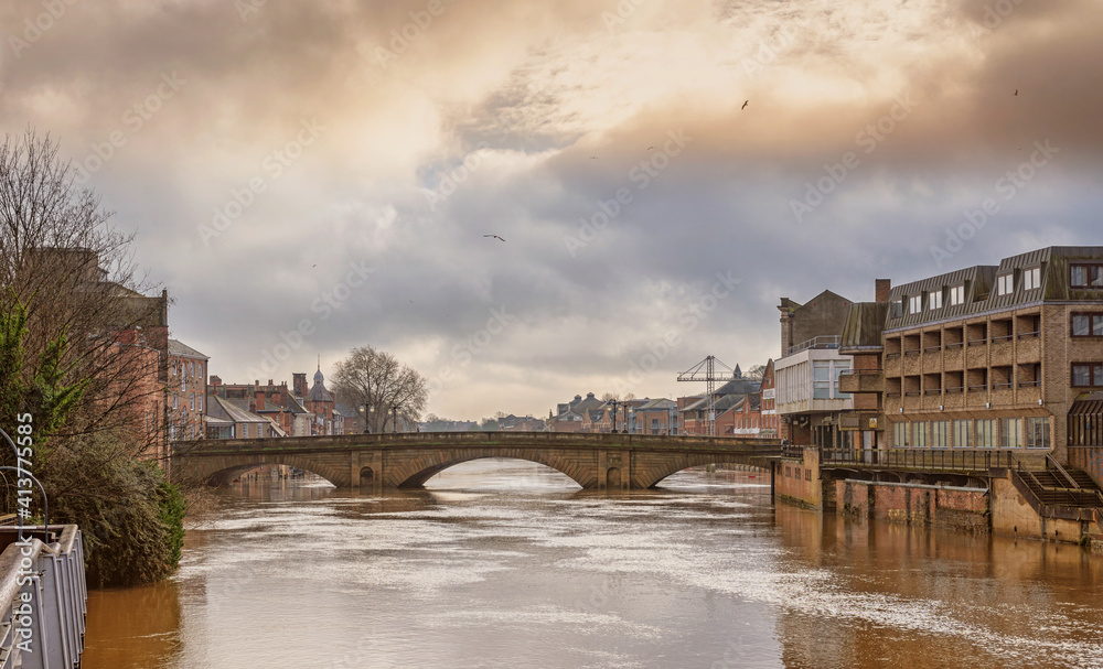 Obraz premium Bridge over a flooded river.