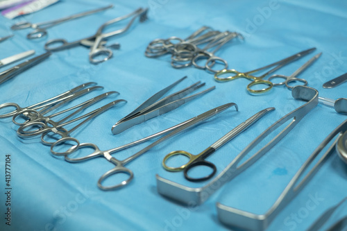 Surgical equipment and medical devices in operating room. Sterile scissors and other medical instruments