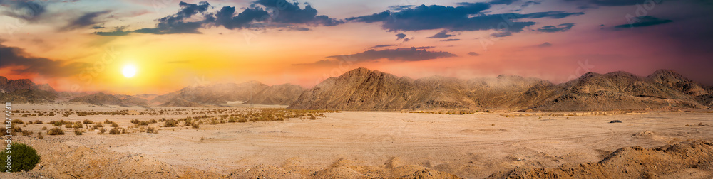 Desert and mountains at sunrise