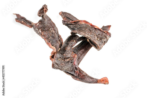 Pet treats on a white background. Dried beef heart.