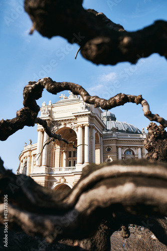 Odessa National Theater of Ballet and Opera, Ukraine in spring time with mulberry tree photo