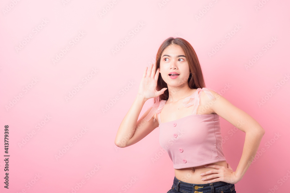 Portrait of beautiful asia young woman on Pink color background with copy space. Human face expressions, emotions feelings, body language,beauty and fashion concept. Portrait of beautiful asia young woman on Pink color background with copy space. Human face expressions, emotions feelings, body language,beauty and fashion concept.